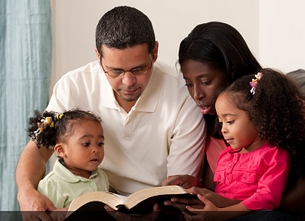 Family reading bible